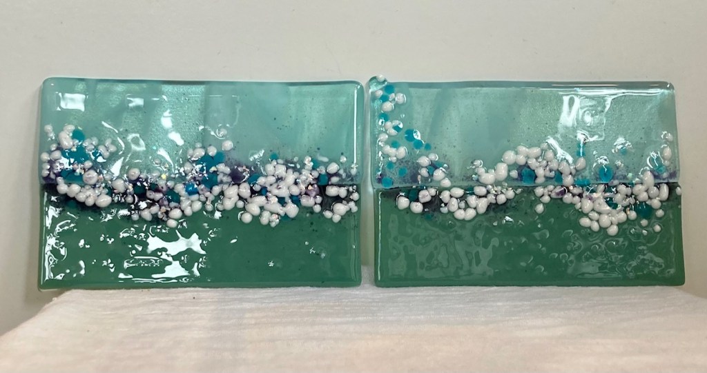 fused glass in shades of blue and light green